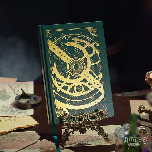 Candela Obscura Limited Edition Core Rulebook. This limited edition rule book features a faux leather cover with debossed design filled with metallic ink, a fully detailed guide on playing and gamemastering the collaborative investigative horror tabletop roleplaying game.