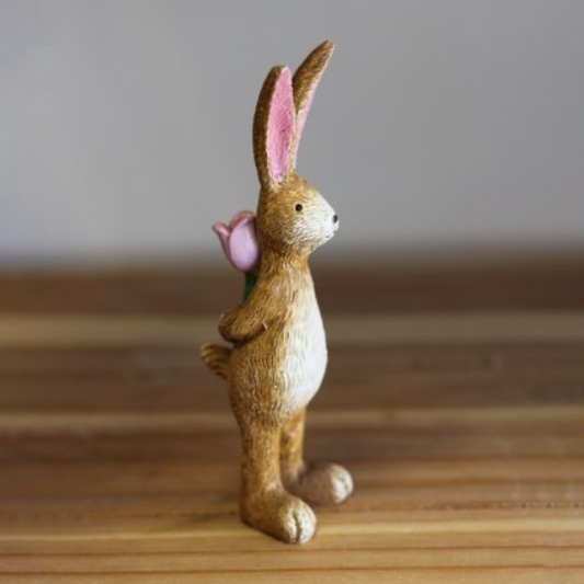 Standing Rabbit With Rose. A cut...