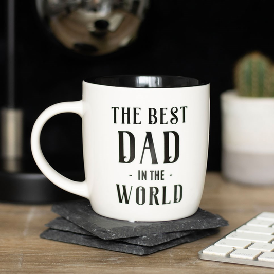 A white mug with the words The Best Dad in The World in black and a black inside making a great gift and showing the father figure in your life that they are the best whether it is a birthday, Christmas, Fathers Day or you just want to let them know how great they are.