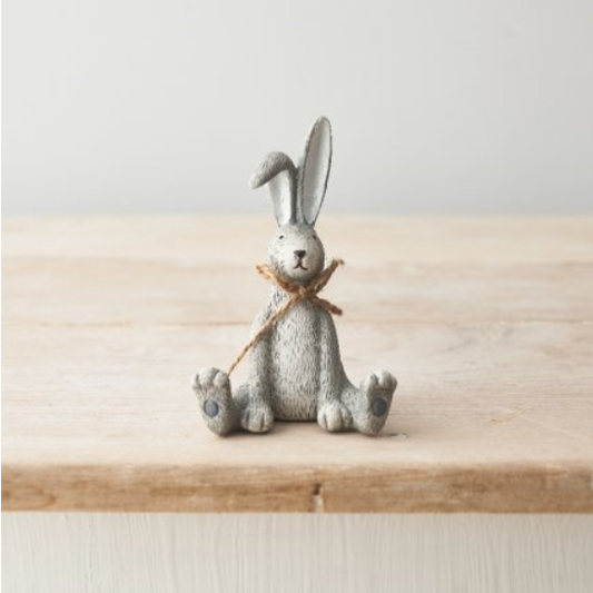 Sitting Grey Rabbit With A Bow. ...