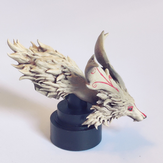 Fae Dragon Bust by Iron Gate Scenery.&nbsp; A 28mm scale printed resin miniature representing a fae dragon with a slender fox style face and wonderfully textured fur for your painting joy and hobby collection