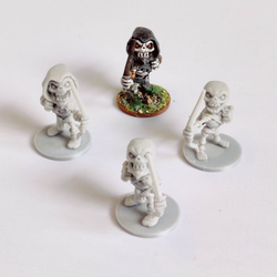 Skeletons set E by Iron Gate Scenery in chibi style.&nbsp; A set of four 28mm scale printed weapon wielding skeletons.
