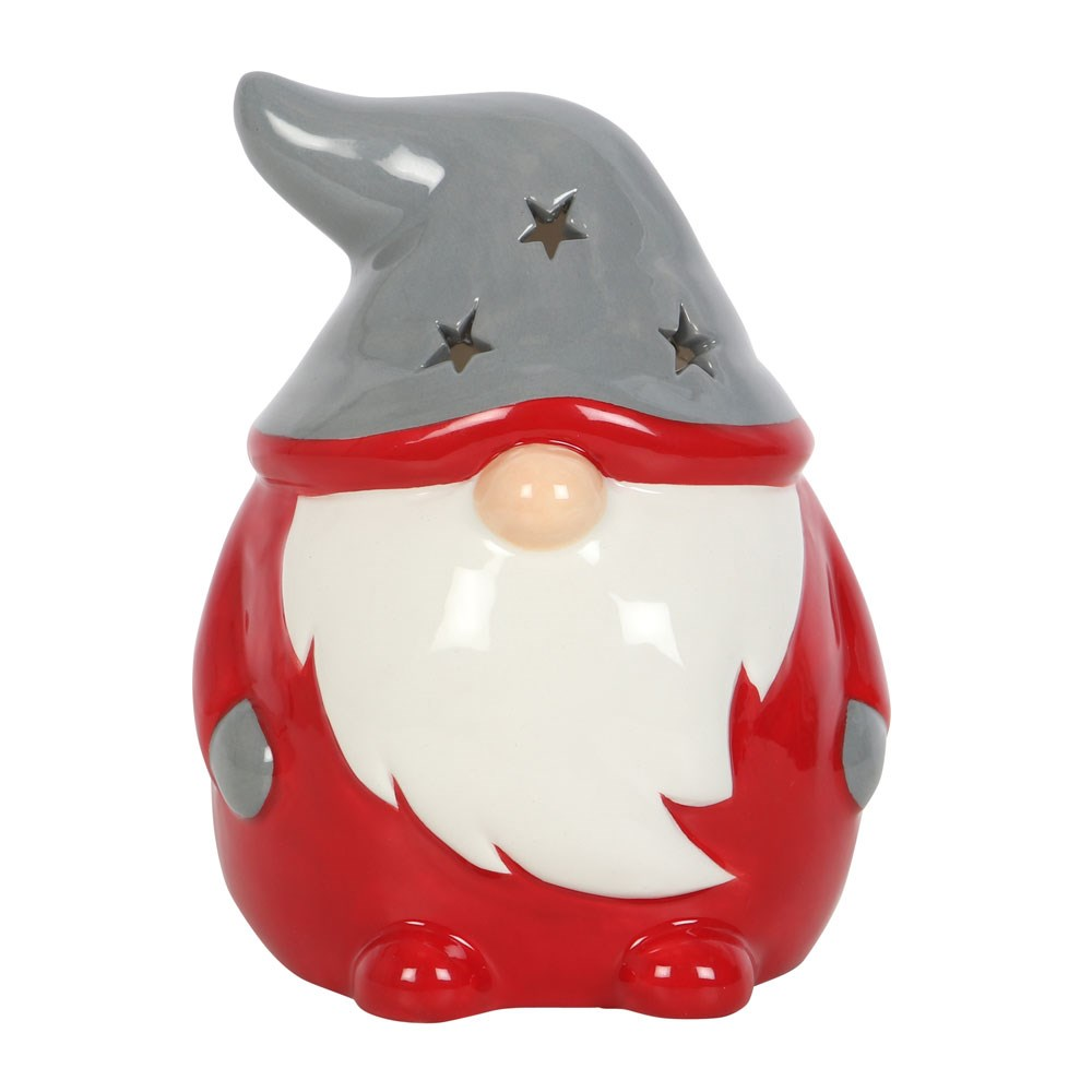 Red & Grey Gonk Tealight Holder. A wonderful Christmas Gonk / Gnome to help bring festive glow to your home, place a standard tealight inside and see the soft glow through the star shapes in the hat and back.