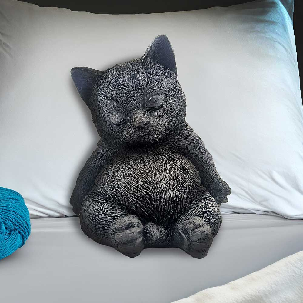 Daydream the sleeping black cat figurines from Nemesis Now an adorable snoozing kitten in a familiar portly tummy and closed eyes sculpt making a wonderful edition to your home or as a gift for a cat loving friend.