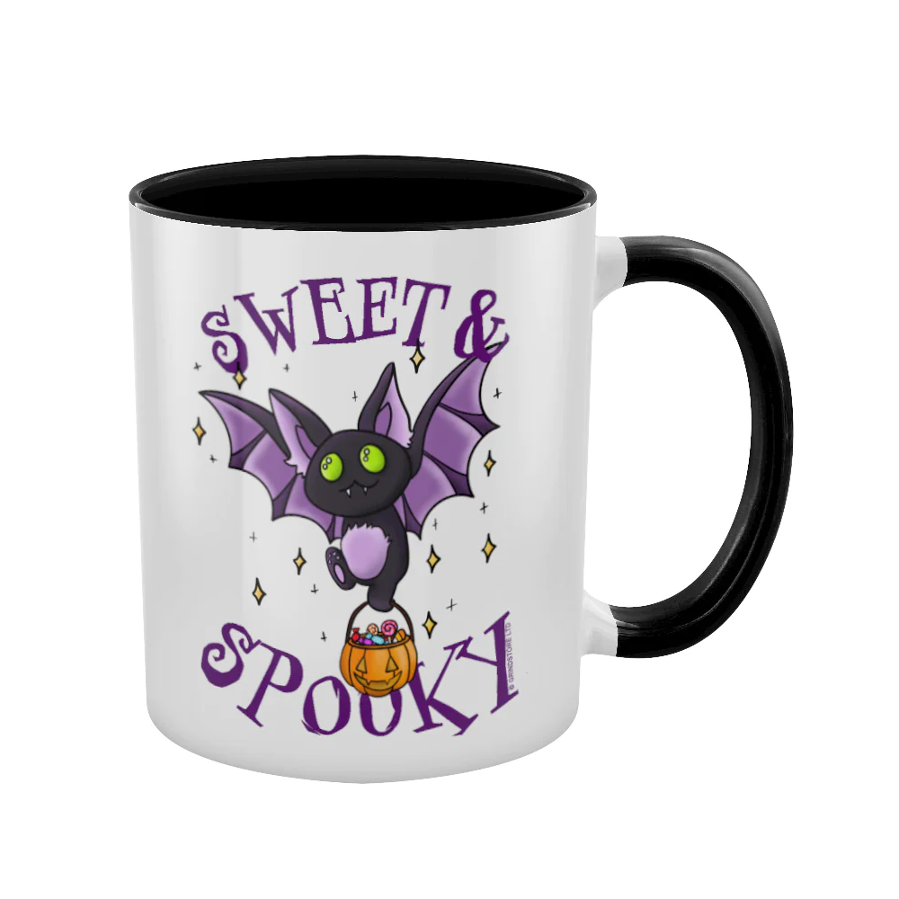 Sweet & Spooky Bat Mug.  A white mug with black inner featuring a super cute bat carrying a Halloween sweet haul and the words Sweet & Spooky making a great edition to your mug collection or as a gift for a friend. 