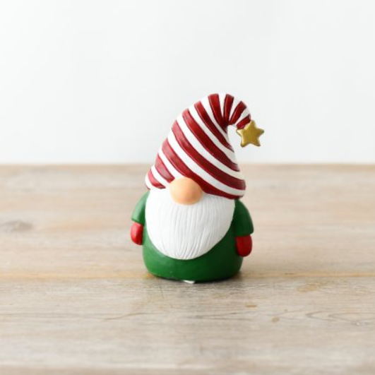 Spruce up your holiday décor with this Christmas Gonk Ornament. This charming decoration features a festive green outfit, white beard, and a red and white striped hat with a gold star. Perfect for adding a cute touch to your holiday decorations