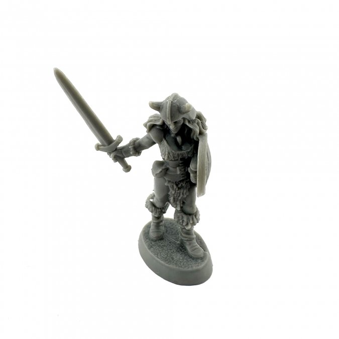 20331 Jana Frostwind female barbarian sculpted by Bobby Jackson from the Reaper Miniatures Bones Black range. A TTRPG miniature representing a female barbarian with a horn helmet, sword and shield for your tabletop games.