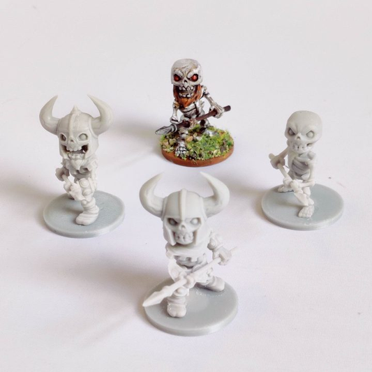 Skeletons set C by Iron Gate Scenery in chibi style.&nbsp; A set of four 28mm scale printed weapon wielding skeletons.&nbsp; These cute but still scary chibi undead are holding spears, with two wearing horned helmets and two have beards, skeletons with beards!&nbsp; They would make a wonderful edition to your RPG adventure as player characters or non player characters (NPC)