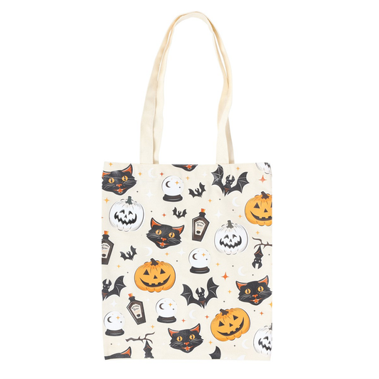 Take your style to the next level with this Spooky Cat &amp; Pumpkin Print Tote Bag. This stylish bag features a playful print of a black cat face, pumpkin, jack o lantern, bat, and potion bottles. Perfect for adding a touch of gothic fun to any outfit, go ahead, show off your edgy side