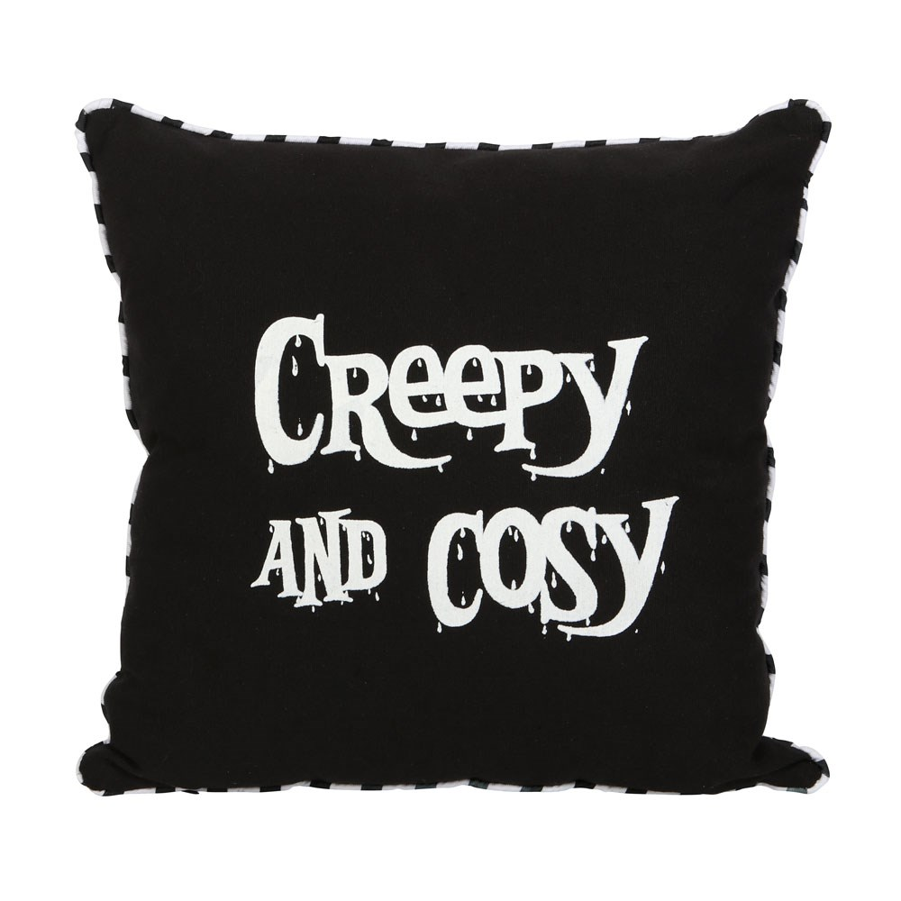 Creepy & Cosy Cushion. A black square cushion with black and white piping and white lettering saying 'Creepy and Cosy'