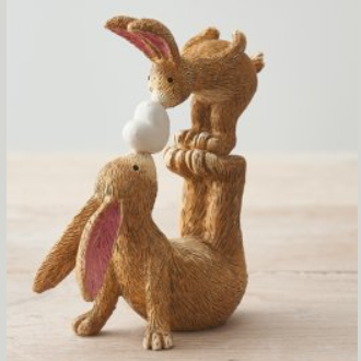 Wonderful bunny ornament of a rabbit and baby bunny adorably posed with the baby bunny standing on the rabbits feet and nose kissing a heart. A sweet figurine  that would make a beautiful gift or edition to your own home. 