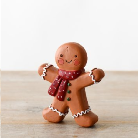 Add a touch of whimsy to your holiday décor with this Gingerbread Man Ornament! This standing decoration features festive icing-style detailing, a charming red scarf with white dots, and a joyful smile. Perfect for celebrating the most wonderful time of the year with a playful touch