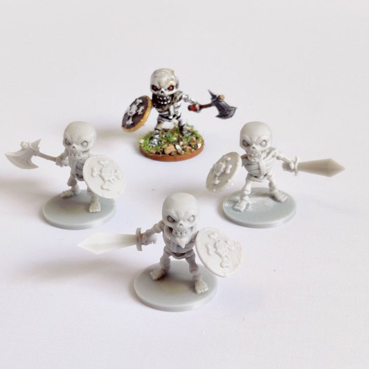 Skeletons set A by Iron Gate Scenery in chibi style.&nbsp; A set of four 28mm scale printed weapon wielding skeletons.&nbsp; These cute but still scary chibi undead are holding shields and weapons and would make a wonderful edition to your RPG adventure as player characters or non player characters (NPC).