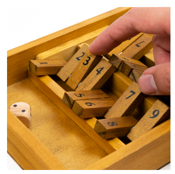 Shut the Box. a dark blue box wi...