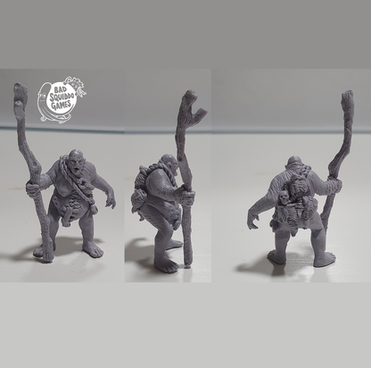 Grandmaw, a resin miniatures by Bad Squiddo Games sculpted by Stephen Blanche representing a naked creature holding a large tree branch as a staff, with parts of her guts hanging out and skeletons strapped to her back making a great miniature for your&nbsp;tabletop gaming, diorama and RPG needs.