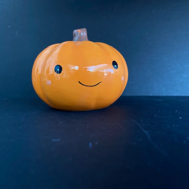 Smiling Ceramic Pumpkin, a super cute little pumpkin with an adorable face that will smile at you and keep you company through your working day or be part of your house decoration, a great edition to your Halloween tier tray or as a gift for a spooky friend.  