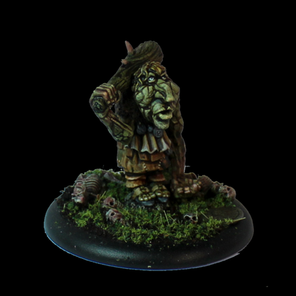 Boulderish “The Butcher” Joinstone by Oakbound Studio. A lead pewter miniature representing a spriggan holding a club