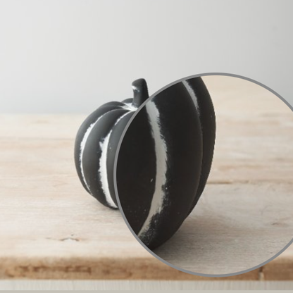 Black Cement Pumpkin 12cm.A wonderfully different black cement pumpkin with white line detail, a heavy ornament for with a rustic style and imperfection design. 