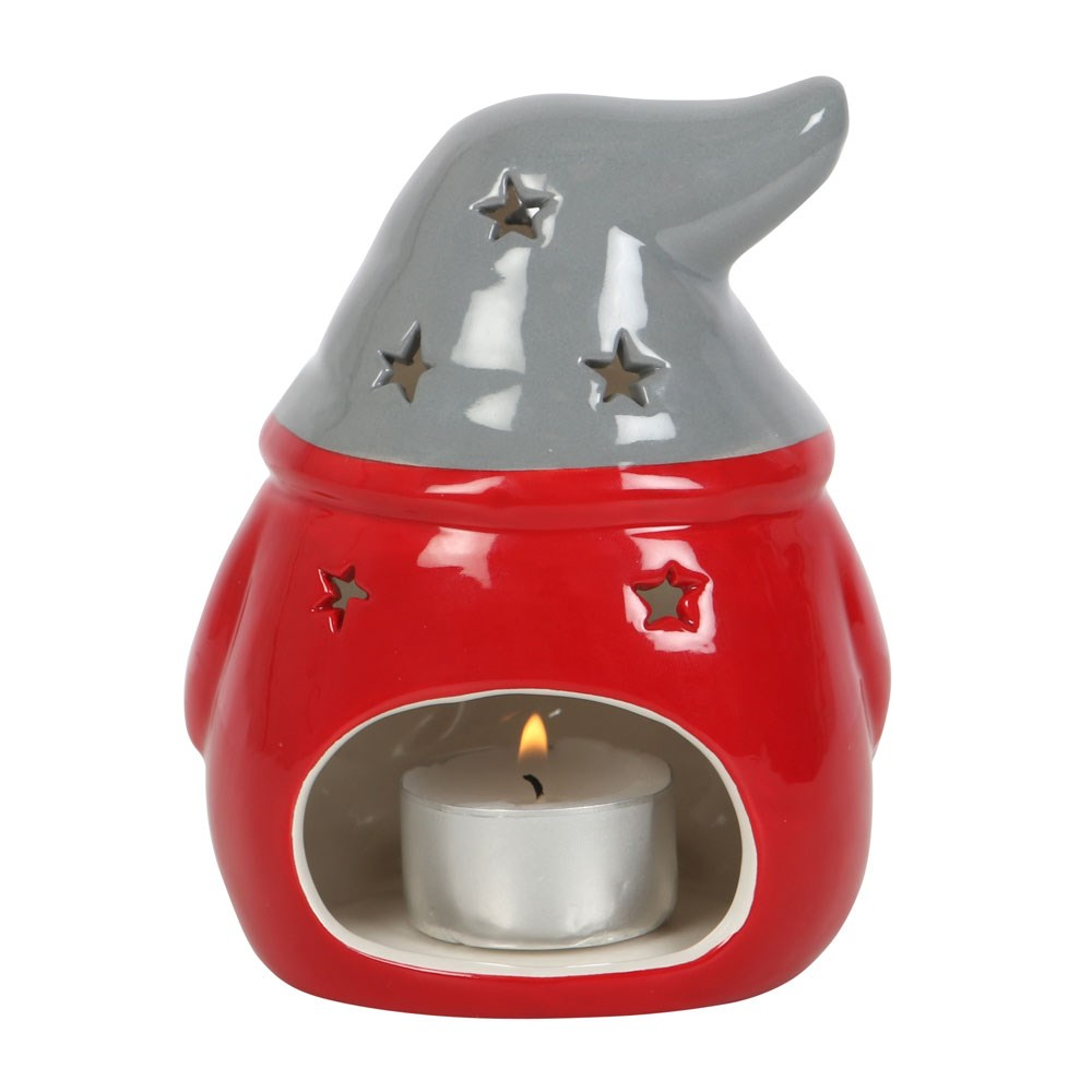 Red & Grey Gonk Tealight Holder. A wonderful Christmas Gonk / Gnome to help bring festive glow to your home, place a standard tealight inside and see the soft glow through the star shapes in the hat and back.