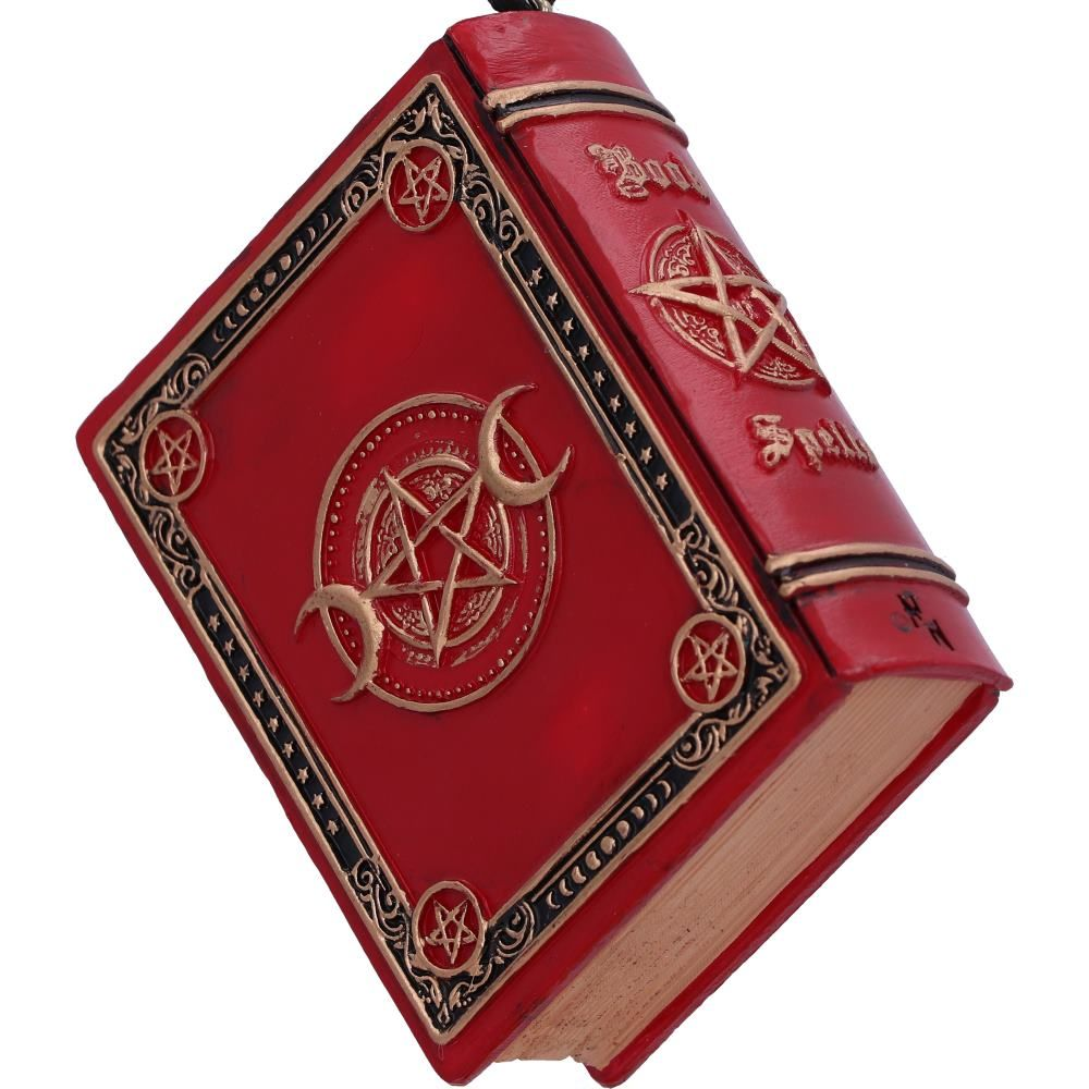 Nemesis Now Book of Spells Hanging Ornament. Red book shaped polyresin ornament with the words Book of Spells on the front