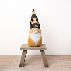 Bee Gonk - the perfect addition to your home decor. This charming 41cm Gonk features a ribbed fabric grey and ochre hat, a white beard, cute nose and warm ochre yellow body. The posable antenna and miniature bee decoration details add an adorable touch. Get yours today and add some whimsy to your home