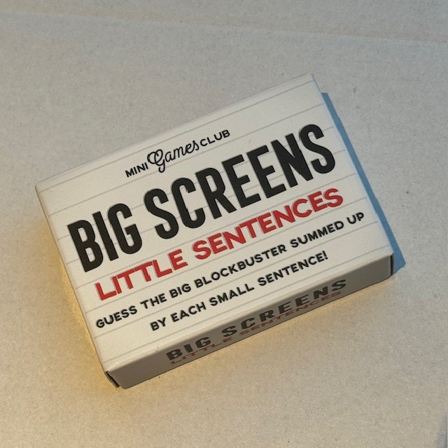 Big Screens Little Sentences, a small white box with black and red writing