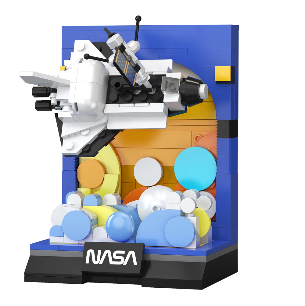 A built lego style space shuttle on a display stand with background detail. This Cada bricks Space Shuttle Discovery Lego compatible building bricks kit enables you to build your own licensed NASA space shuttle capturing the essence of the iconic Discovery offering both educational and entertaining experience.