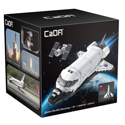 A cube shaped black box with dome of the earth and picture of the lego style space shuttle on the front. This Cada bricks Space Shuttle Discovery Lego compatible building bricks kit enables you to build your own NASA model representing the iconic space shuttle which has opening cargo bay doors, functional arm which can be extended and retracted adding to the play experience making a great gift for building brick and space fans alike