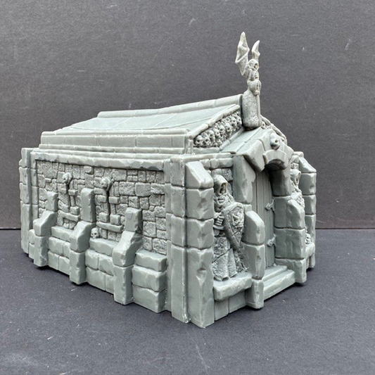 Forlorn Crypt from Reaper Miniatures. An unboxed / not in retail packaging crypt with skeleton and stone detail from the Bones6 kickstarter for your roleplaying games (RPG), painting, collecting and gaming needs