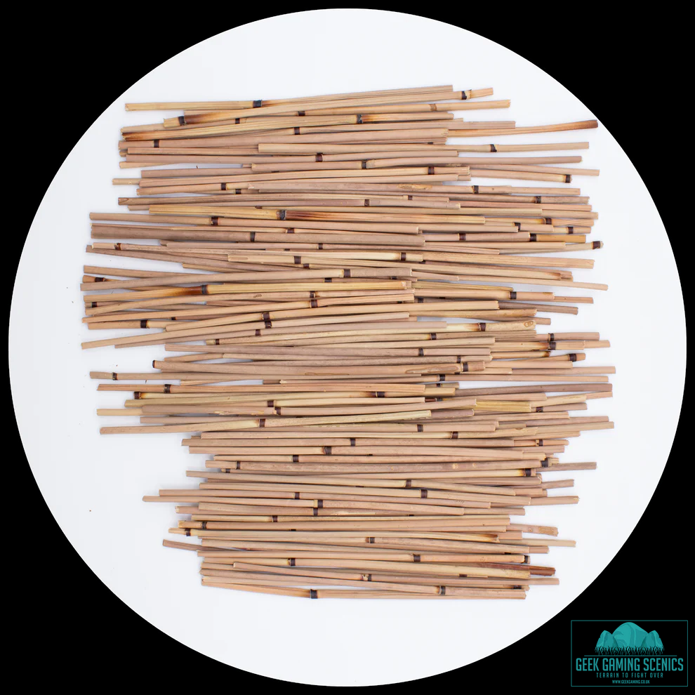 Geek Gaming Scenics Miniature Reed Stalks / Bamboo. A pile of pre cut bamboo sticks on a white background