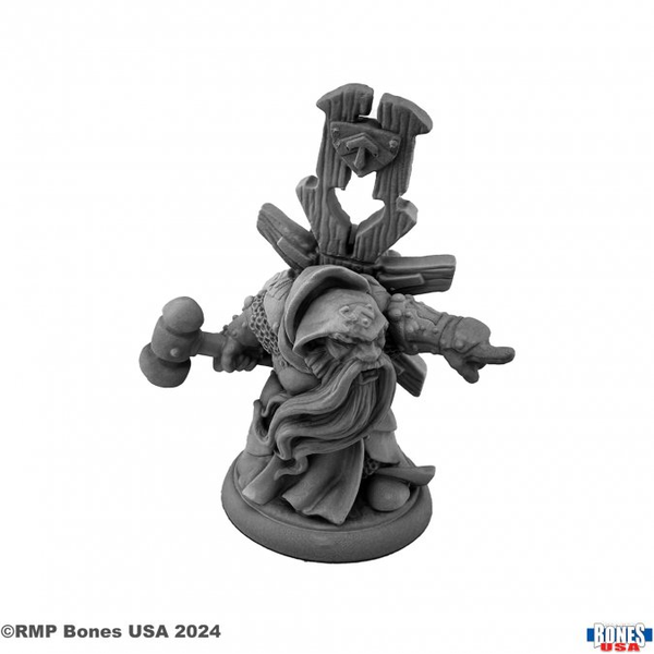 30172 Ivar Dwarf Priest from the Reaper bones USA legends range, sculpted by Werner Klocke. A grumpy looking Dwarf with his mouth open and his finger pointing, holding a hammer in one hand, a wooden pack on his back and long beard flowing, a great edition to you Dungeons &amp; Dragons, tabletop game or other RPG