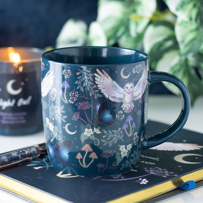 Night Flight a beautiful ceramic mug with sea green background decorated with crescent moons, forest plants, mushrooms and owls, a wonderful edition to your kitchen or as a gift