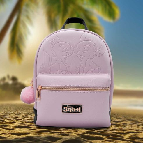 Stitch & Angel baby pink Backpack. A fantastic gift for any Disney Stitch fan featuring an embossed Angel & Stitch touching noses design on the front and a front zip compartment this pink faux leather backpack has adjustable straps on the back, rose gold zip detail and handle on the top. Add this adorable Stitch backpack to your collection today