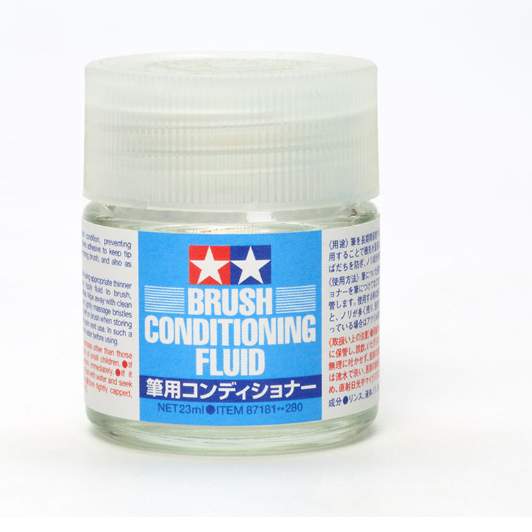 Squat Glass jar with blue and white label. Tamiya Brush Conditioning Fluid.