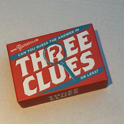 Three Clues matchbox game in a red and blue box