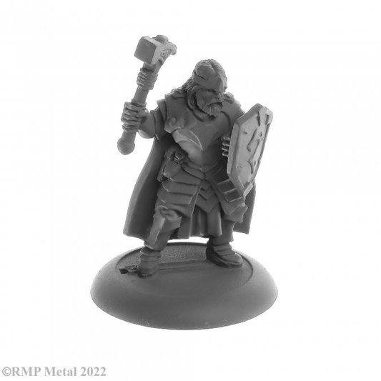 Balzador from the Dark Heaven Legends metal range by Reaper Miniatures sculpted by Bob Ridolfi. A male human cleric holding a shield in one hand and a hammer in the other, wearing full plate armour and a cloak