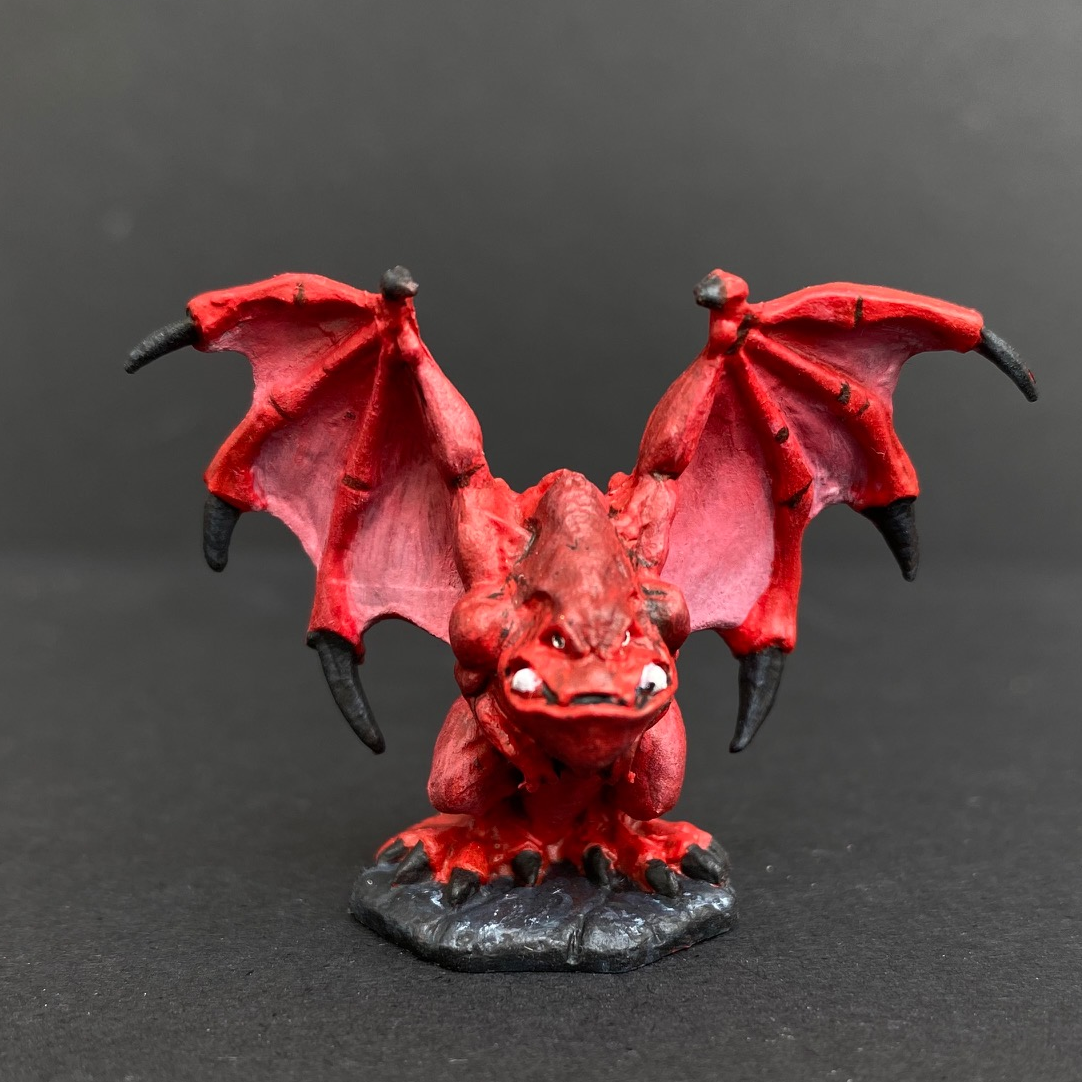 Hand painted demon from the range by Reaper Miniatures. Mrs MLG has painted this little demon with a red and black colour scheme. 