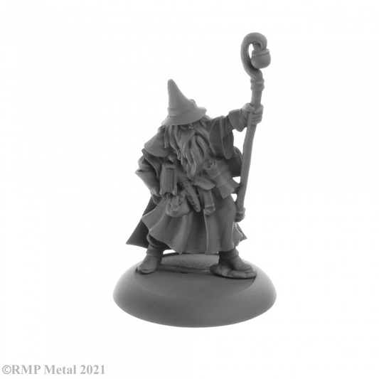 Luwin Phost from the Dark Heaven Legends metal range by Reaper Miniatures sculpted by Bobby Jackson.  A wonderful metal gaming figure of a traditional looking wizard wearing a pointed hat, robe and carrying books and a staff