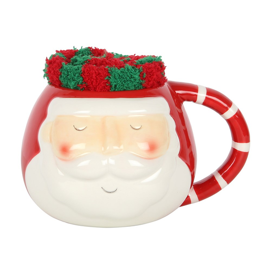  A rounded mug with Santa face d...