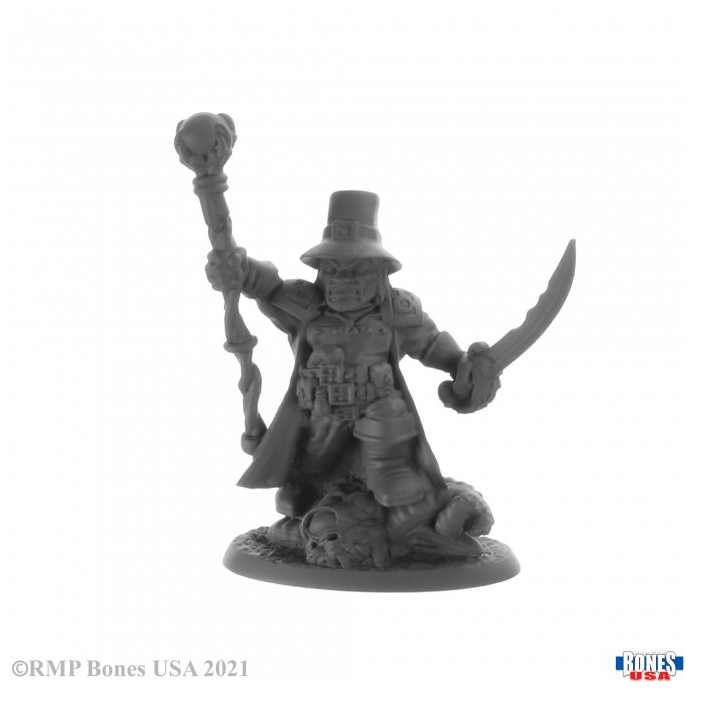 Arkus Harn dwarf witch hunter reaper miniatures 30011. sword in one hand and a staff in the other he stand with one foot aloft on a recently slain creature.