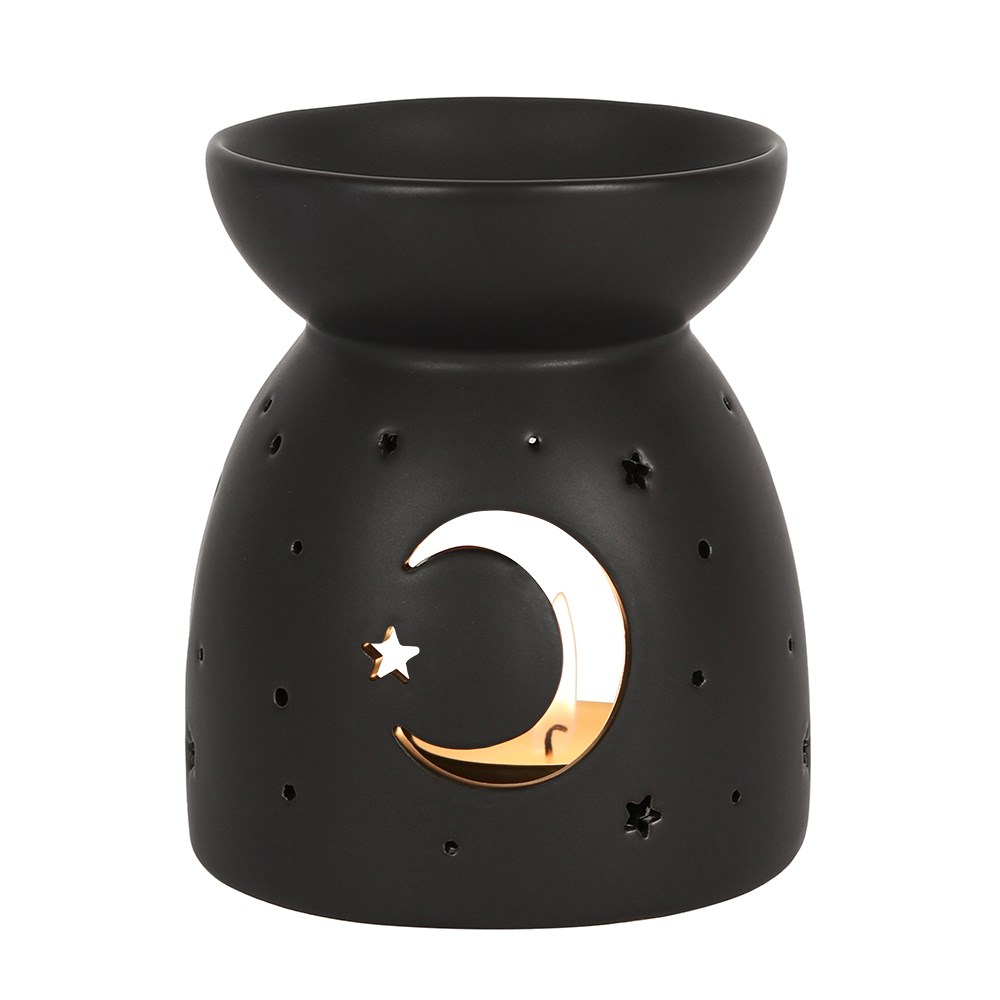 A matt black oil burner with a cut out crescent moon and star design