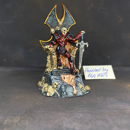 Dragoth pre painted by Mrs MLG. Dragoth sat on his throne with one hand on his sword, his throne is made from bones and skin 