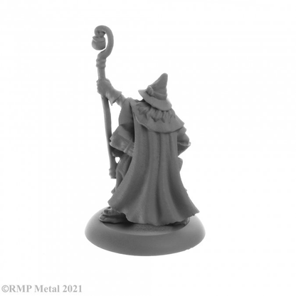 Luwin Phost from the Dark Heaven Legends metal range by Reaper Miniatures sculpted by Bobby Jackson.  A wonderful metal gaming figure of a traditional looking wizard wearing a pointed hat, robe and carrying books and a staff