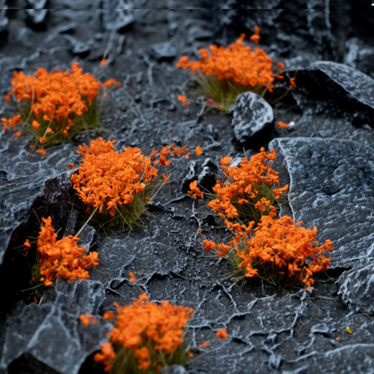 Tufts covered with bright orange petals and green leaves by Gamers Grass