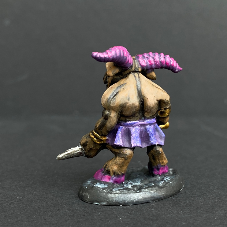 Hand painted minitaur from the Reaper Miniatures range. Mrs MLG has painted this minitaur with sword giving him bright pink horns and hooves