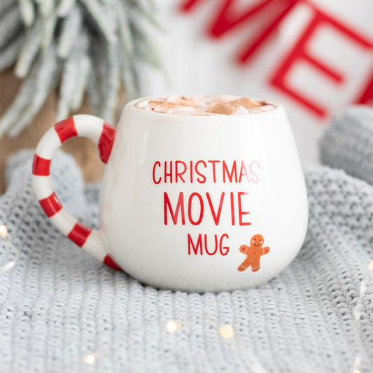 white rounded mug features a red...