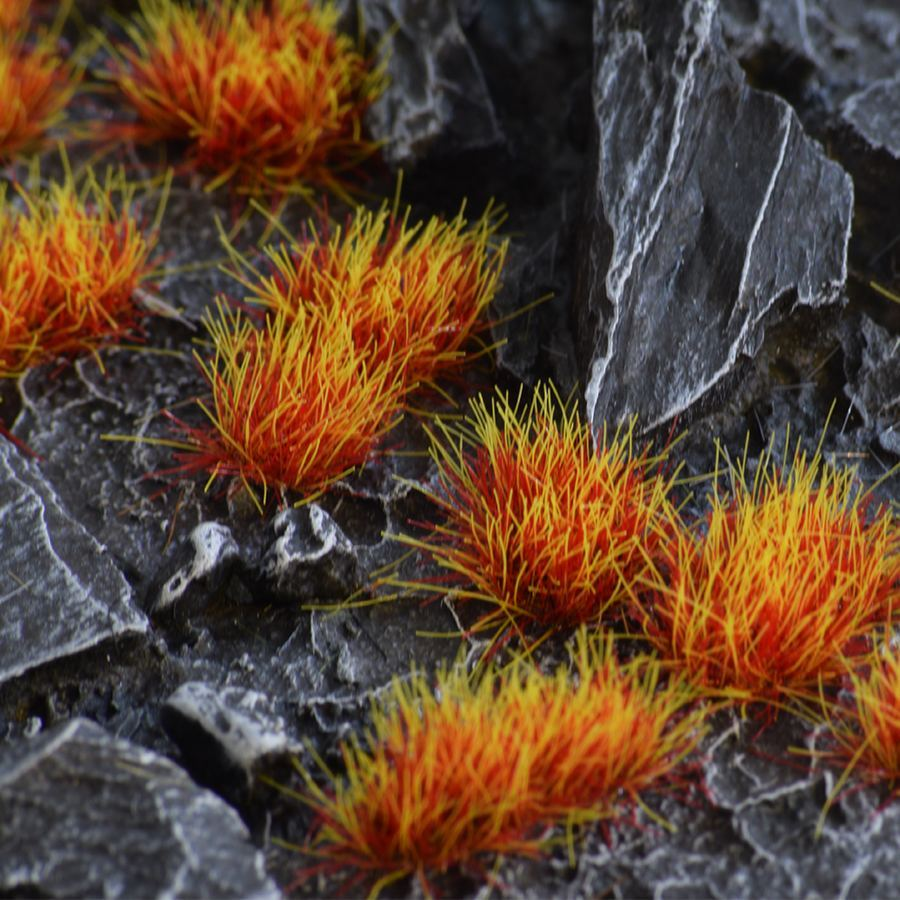 These alien tufts are orange yellow in a wild tuft style with a slightly darker shade at the base rising to a light shade on top