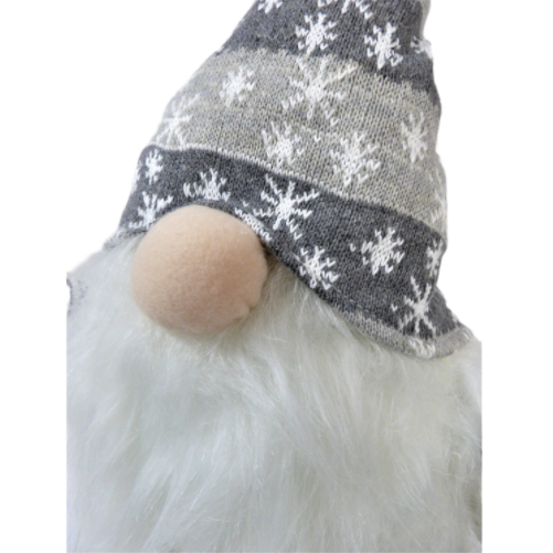 Grey Christmas gonk. posable grey stripe hat featuring snowflake design topped with a grey star, white beard, posable knitted striped arms, nose poking out 