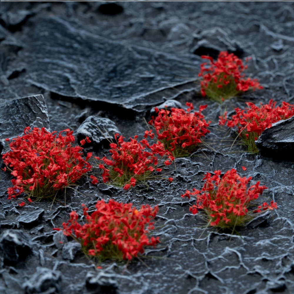 hese tufts, by Gamers Grass, are covered with red petals 