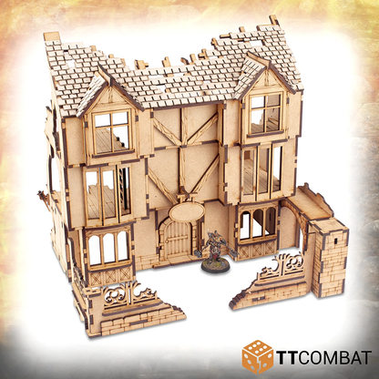 With a fairly complete frontage you can see that this tavern is toppled at the rear, most of the back has crumbled away with damage clearly visible, it will be hard to serve ale in here again for a while.  - view with miniature for scale